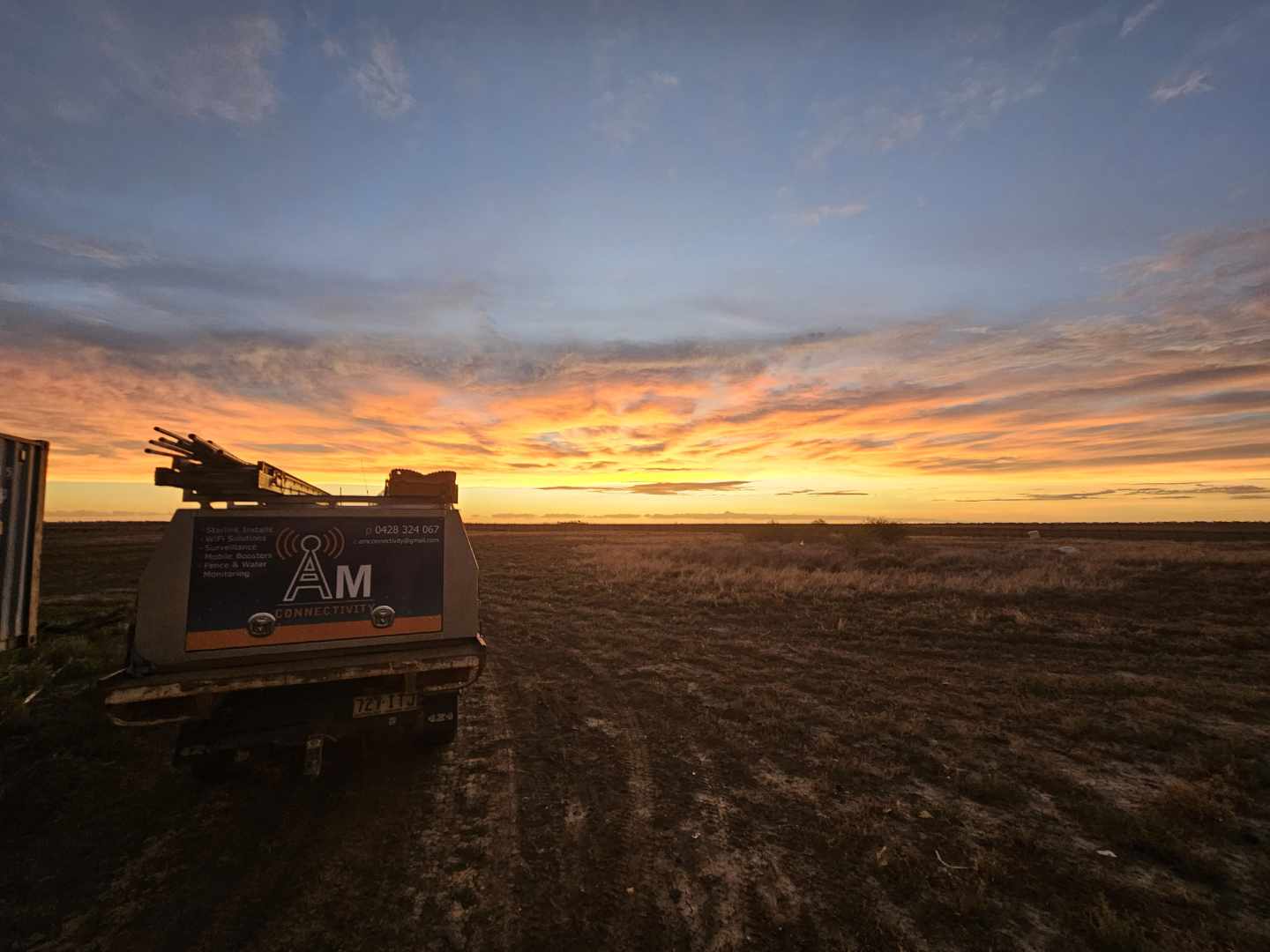 AM Connectivity work vehicle at sunset